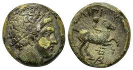 Kings of Macedon. Philip II (359-336 BC). Æ (17mm, 5.7g). Uncertain Macedonian mint. Diademed head of Apollo r. R/ Horseman r.; below, trident head an...
