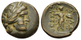 Thessaly, Thessalian League, c. 196-27 BC. Æ (18,3mm, 6.9g). Philok... and Asor..., magistrates. Laureate head of Apollo r. R/ Athena Itonia advancing...