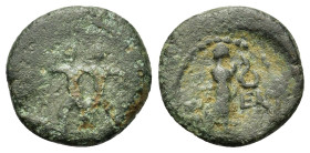 Pisidia, Etenna, c. 1st century BC. Æ (13,3mm, 1.7g). Two men standing facing, fighting with a double-axe and a curved knife. R/ Nymph advancing r., h...