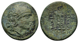 Seleukid Kings. Antiochos II Theos (261-246 BC). Æ (17mm, 3.9g). Antioch. Laureate head of Apollo r. R/ Tripod, monograms to outer l. and r., Seleukid...