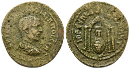 Philip I (244-249). Mesopotamia. Nisibis. Æ (25mm, 10.5g). Laureate and cuirassed bust right. R/ Tetrastyle temple containing, statue of tyche seated ...