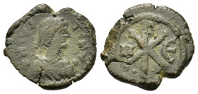 Justin I (518-527). Æ 5 Nummi (15,9mm, 2g). Diademed, draped, and cuirassed bust r. R/ Large Christogram between N and Є, two pellets below. Sear 93....