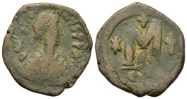 Justinian I (527-565). Æ 40 Nummi (29,1mm, 12.65g). Constantinople. Diademed, draped and cuirassed bust r. R/ Large M flanked by star and cross; B//CO...