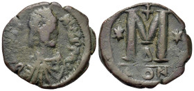 Justinian I (527-565). Æ 40 Nummi (31mm, 16g). Constantinople. Diademed, draped and cuirassed bust r. R/ Large M flanked by two stars; Δ//CON. Sear 16...