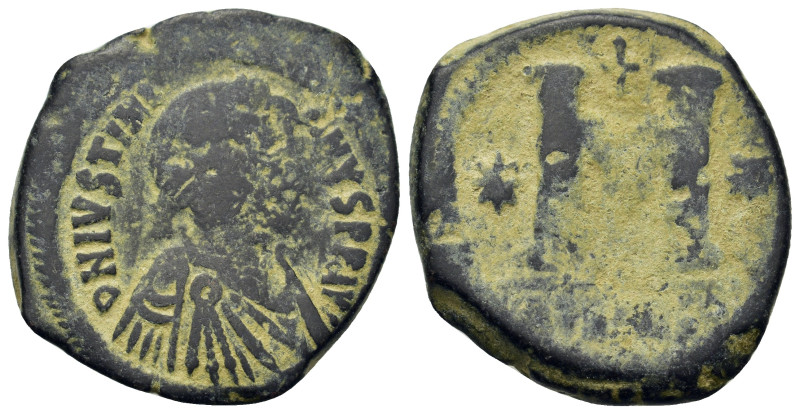 Justinian I (527-565). Æ 40 Nummi (29,4mm, 16.8g). Antioch, AD 533-537. Diademed...