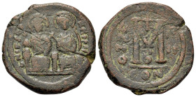 Justin II and Sophia (565-578). Æ 40 Nummi (28,5mm, 12.6g). Constantinople, year 4 (568/9). Nimbate figures of Justin and Sophia seated facing on doub...