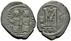 Justin II and Sophia (565-578). Æ 40 Nummi (29,2mm, 14.4g). Constantinople, year 6 (570/1). Nimbate figures of Justin and Sophia seated facing on doub...