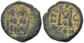 Justin II and Sophia (565-578). Æ 40 Nummi (30,7mm, 14.6g). Constantinople, year 9 (AD 573/4). Nimbate figures of Justin and Sophia seated facing on d...