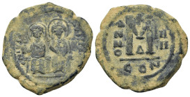 Justin II and Sophia (565-578). Æ 40 Nummi (30mm, 12.5g). Constantinople, year 4 (AD 568/9). Nimbate figures of Justin and Sophia seated facing on dou...