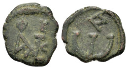 Justin II (565-578). Æ 5 Nummi (15,2mm, 1.4g). Constantinople. Monogram. R/ Large Є; A to r. Sear 363.