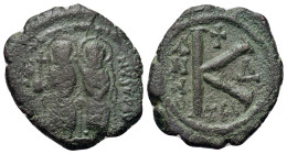 Justin II and Sophia (565-578). Æ 20 Nummi (22mm, 5.4g). Thessalonica, year 5 (AD 569/70). Nimbate figures of Justin and Sophia seated facing on doubl...