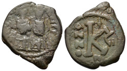 Justin II and Sophia (565-578). Æ 20 Nummi (22mm, 6.7g). Nicomedia, year 7 (571/72). Justin and Sophia seated facing on double throne, holding globus ...
