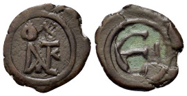 Justin II (565-578). Æ 5 Nummi (16,2mm, 1.2g). Justin II Monogram. R/ Large E; cross to r. 
Sear 386.