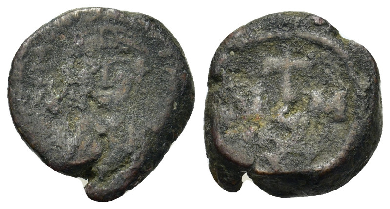 Maurice Tiberius (582-602). Æ 20 Nummi (15,5mm, 4,00g). Carthage. Helmeted and c...