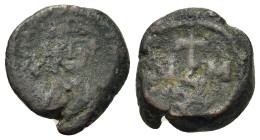 Maurice Tiberius (582-602). Æ 20 Nummi (15,5mm, 4,00g). Carthage. Helmeted and cuirassed bust facing. R/ Cross potent on globe; N-M flanking; XX below...