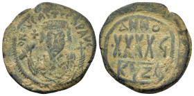 Phocas (602-610). Æ 40 Nummi (28,1mm, 11g). Cyzicus, year 6 (AD 607/8). Crowned facing bust, wearing consular robes, holding mappa and eagle sceptre w...