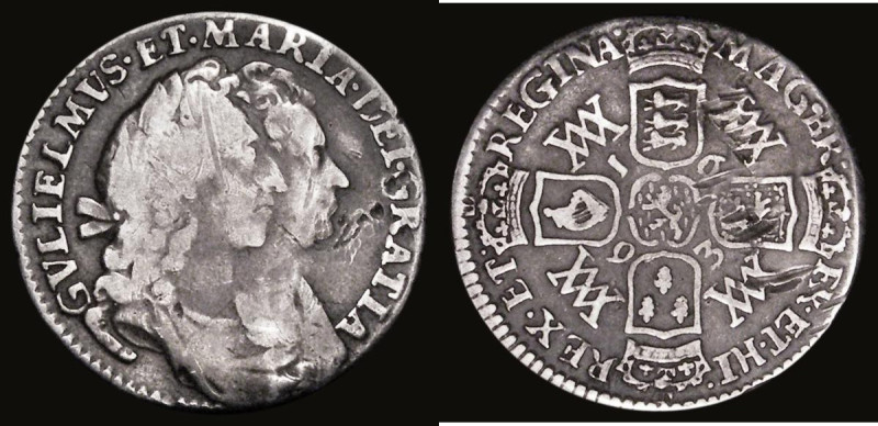 Sixpence 1693 Large G in REGINA E's in ET and REGINA appear as reversed inverted...