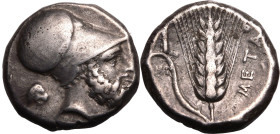 MAGNA GRAECIA. LUCANIA, METAPONTION. 
Silver stater, circa 340-330 BC. 
Obv: Head of Leukippos right, wearing Corinthian helmet; head of lion behind...