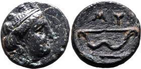 ANCIENT GREECE. IONIA, MYOUS. 
Bronze ae10, circa 400-350 BC. 
Obv: turreted head of Kybele right. Rev: bow and arrow; MY above.
About Good Very Fi...