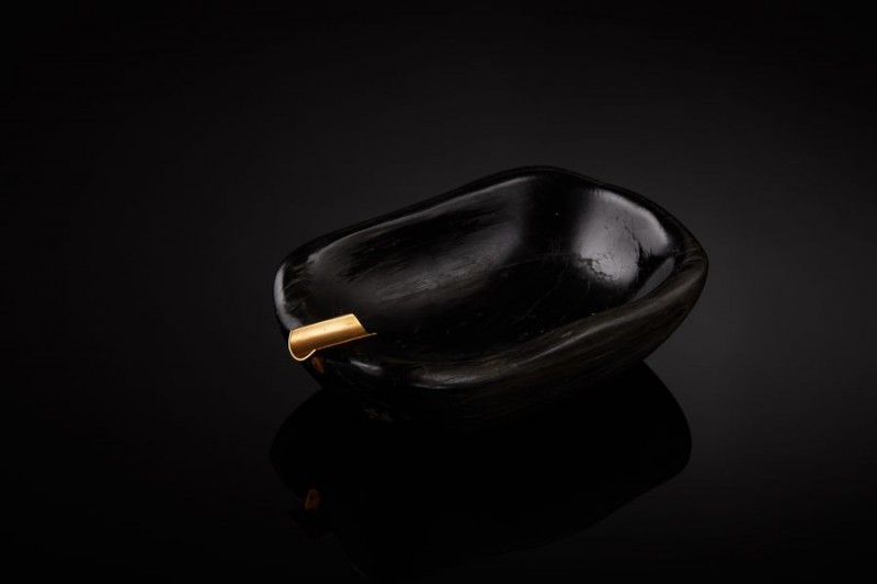 Vintage Cartier Hardstone (obsidian?) ashtray with gold cigarette rest.
Signed C...
