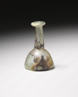 **Item Description**

Blown glass flask or unguentarium in the form of a "candlestick"

**Era**

Ancient Roman Glass, 100 AD-400 AD

**Condition**

Ou...