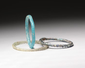 Group of 3 of Ancient Roman Glass Bracelets 1st-3rd Century AD. of Thin Glass, Twisted and Very Colorful. Choice Pieces! Estimate: 300 Euro- 600 Euro