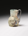 **Item Description**

Rare Ancient Sasanian iridescent light blue blown glass bottle with a single handle

**Era**

Ancient Sasanian Glass, 3rd-7th Ce...