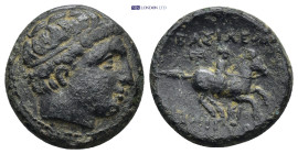 KINGS of MACEDON. Philip II. 359-294 BC. Uncertain mint in Macedon. AE (5.28 Gr. 19mm.)
Head of male right, wearing tainia 
Rev. Horseman riding right...