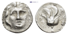 ISLANDS off CARIA, Rhodos. Rhodes. Circa 229-205 BC. AR Hemidrachm (11mm, 1.0 g). Uncertain magistrate. Head of Helios facing slightly right / Rose wi...