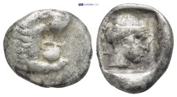 CARIA, Knidos. Circa 411-405/4 BC. AR Drachm (17mm, 6.05 g). Forepart of lion roaring right / Head of Aphrodite right, hair in sphendone; A behind nec...