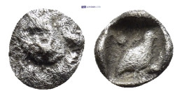 CARIA, Mylasa. Circa 420-390 BC. AR Tetartemorion (5mm, 0.27 g). Forepart of lion left, head right / Bird standing right; two pellets around; all with...