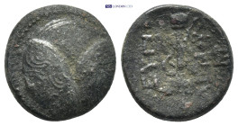 CARIA, Mylasa. Eupolemos. Circa 295-280 BC. AE (4 Gr. 16mm.) 
Three overlapping Macedonian shields, the outer two with spearheads on bosses
Rev. Sword...