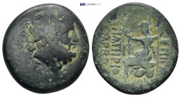 Bithynia, Nicomedia. Æ (23mm, 7.8 g). C. Papirius Carbo. Procurator, 62-59 BC. Dated CY 224 (59/8 BC). Laureate head of Zeus r. R/ Roma seated l. on p...