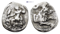 Lycaonia, Laranda, c. 324/3 BC. AR Obol (10mm, 0.67 g). Baaltars seated l., holding grain ear, grape bunch, and sceptre. R/ Forepart of wolf r.; inver...