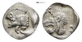 Mysia. Kyzikos circa 525-475 BC. Hemiobol AR (9mm, 0.41 g). Forepart of boar left; tunny upward to right / Head of roaring lion left, with star to lef...