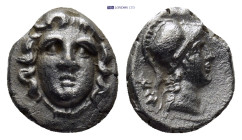 Pisidia. Selge circa 350-300 BC. Obol AR (1.03 Gr. 10mm.)
 Facing gorgoneion 
Rev. Helmeted head of Athena right, astragalos behind.