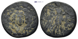 PONTOS. Amisos. Struck under Mithradates VI. Circa 105-90 or 90-85 B.C. (7.38 Gr. 21mm.)
 Aegis with gorgon's head at center 
Rev. Nike advancing righ...