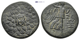 Pontos. Amisos. Time of Mithradates VI Eupator circa 120-63 BC. AE (20mm, 6.83 g) Aegis with Gorgon's head at center Rev. Nike advancing right, holdin...