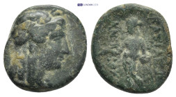 SELEUKID KINGDOM. Antiochos III Megas.(Circa 223-187 BC).AE. (4.17 Gr. 17mm.) Sardes. 
 Laureate head of Apollo right. 
Rev. Apollo standing left, exa...