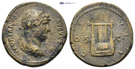 Hadrian Rome, AD 125-128. AE. (7.38 Gr. 24mm.)
Laureate, draped and cuirassed bust right, seen from behind 
Rev. COS III, lyre, S-C across fields.