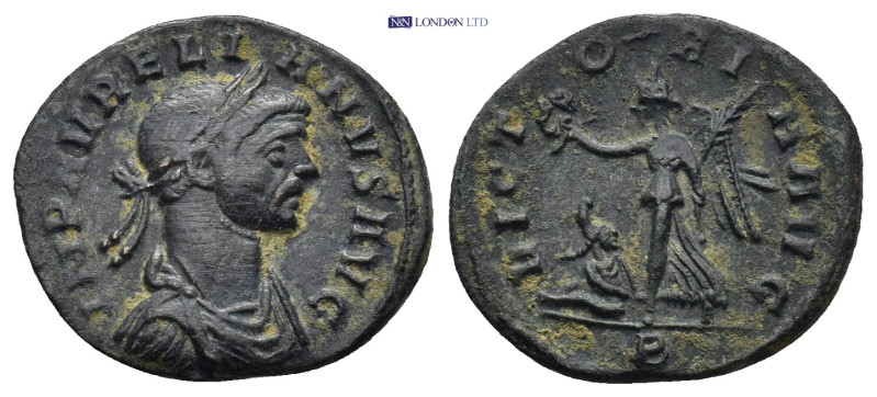 Aurelian. A.D. 270-275 AE (2.14 Gr. 18mm.). Rome
Laureate and cuirassed bust rig...