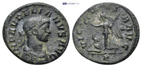 Aurelian. A.D. 270-275. AE (2.3 Gr. 17mm.). Rome
Laureate and cuirassed bust right 
Rev. Victory advancing left, holding wreath and palm, bound captiv...