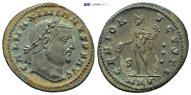 Maximianus Ae Nummus. AD 295-296 Cyzicus Follis. (5.92 Gr. 26mm.)
Laureate head right. 
Rev. Genius standing left, modius on head, naked but for chlam...