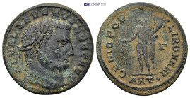 Severus II, as Caesar, Æ Nummus. Antioch, AD 305. (8.18 Gr. 27mm.)
Laureate head right 
Rev. Genius standing left, modius on head, naked but for chlam...