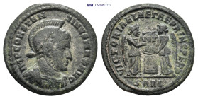 Constantine I, 307-337. Arelate, circa 319 Follis, Æ (18mm, 2.74 g) IMP CONSTANTINVS MAX AVG, Laureate, helmeted and cuirassed bust right / VICTORIAE ...