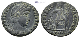 VALENTINIAN I (364-375). Follis. (1.81 Gr. 17mm.)
Diademed, draped and cuirassed bust right.
Rev. Emperor advancing right, holding labarum and graspin...