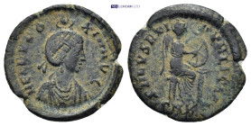 Aelia Eudoxia. Follis. 401-403 AD. Cyzicus. (2.27 Gr. 18mm.)
Diademed and draped bust to right, being crowned by the hand of God above.
 Rev. Victory ...