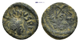Marcian. AD 450-457. Æ (10mm, 0.84 g). Constantinople mint. Pearl-diademed, draped, and cuirassed bust right / Monogram; cross above, all within wreat...