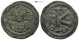 JUSTINIAN I. 527-565 AD. AE Half Follis. Antioch mint. Dated year 13 (539/540 AD). (11.63 Gr. 31mm.) 
Diademed, helmeted, and cuirassed facing bust, h...