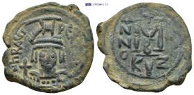 Maurice Tiberius (582-602). ’ 40 Nummi (13.06 Gr. 331mm.). Kyzikos
 Helmeted and cuirassed bust facing, holding globus cruciger. 
Rev Large M, cross a...